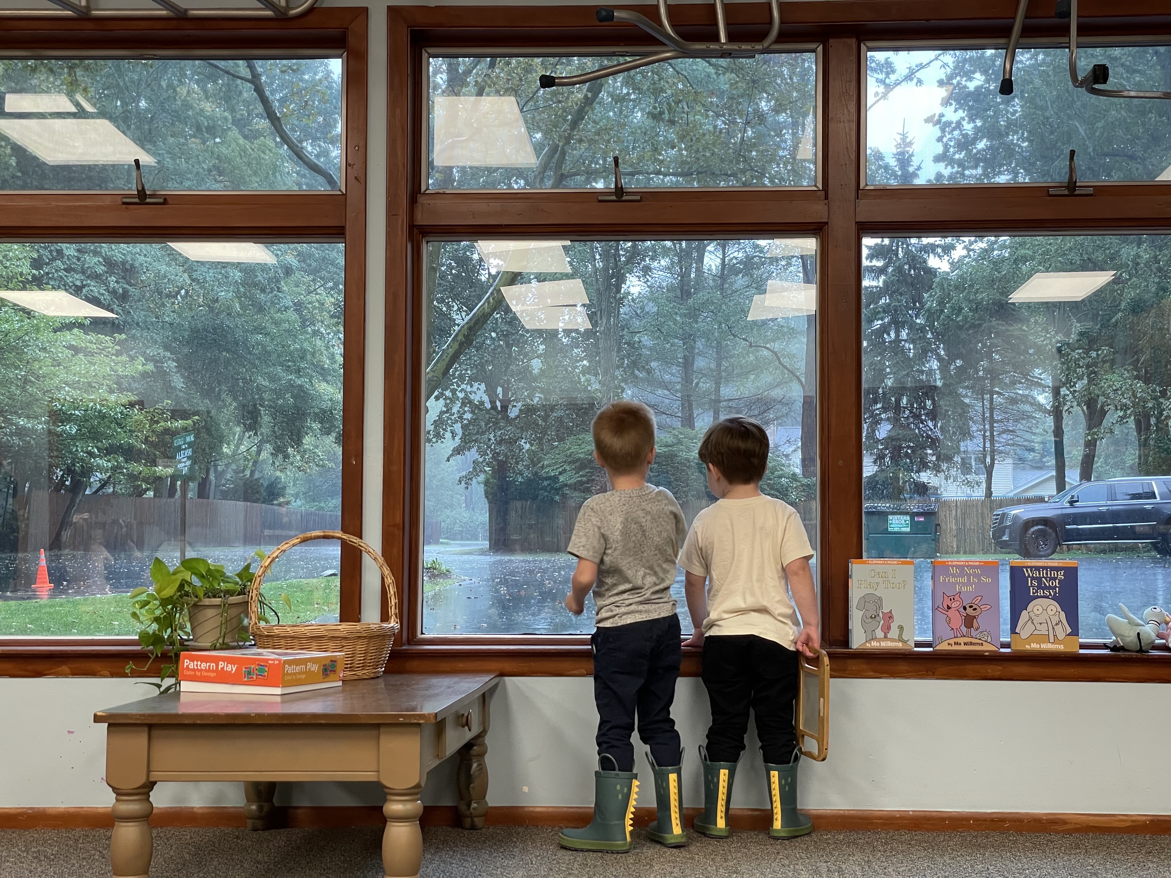 Students take a break from the rain in their classroom at Northport Nursery School. 