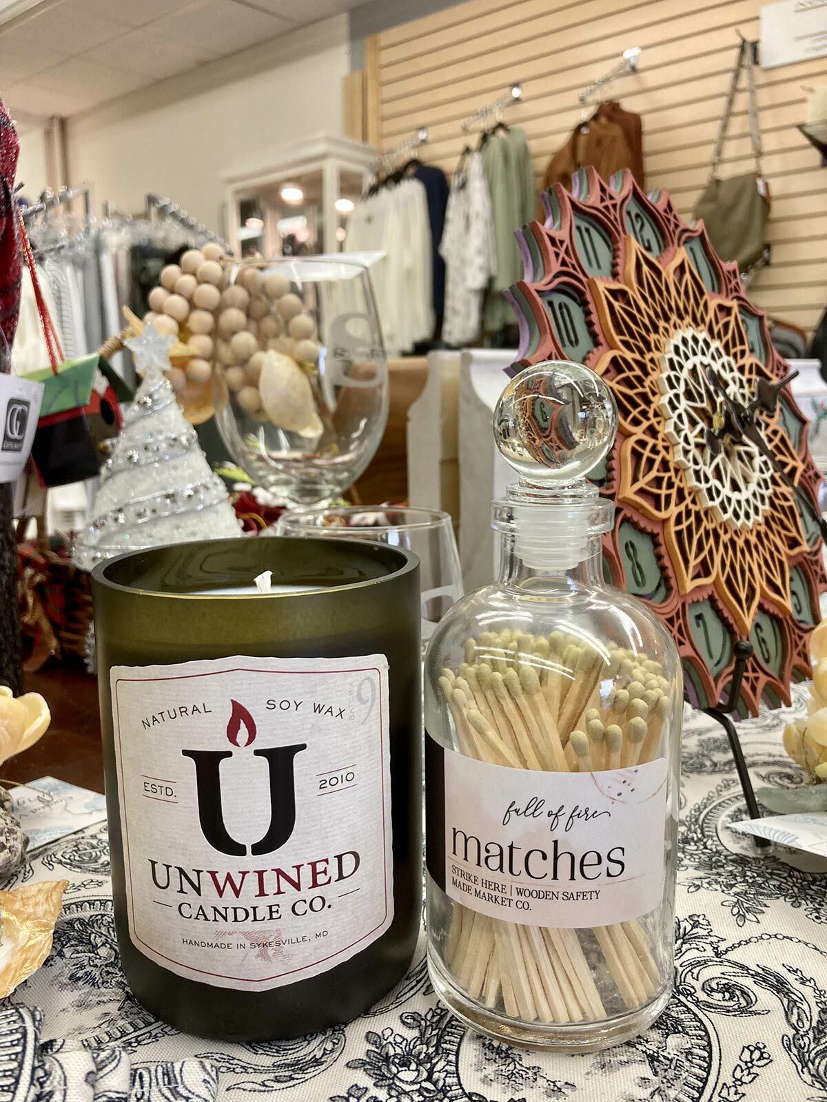 A candle pairs with a jar of matches for a nice gift.