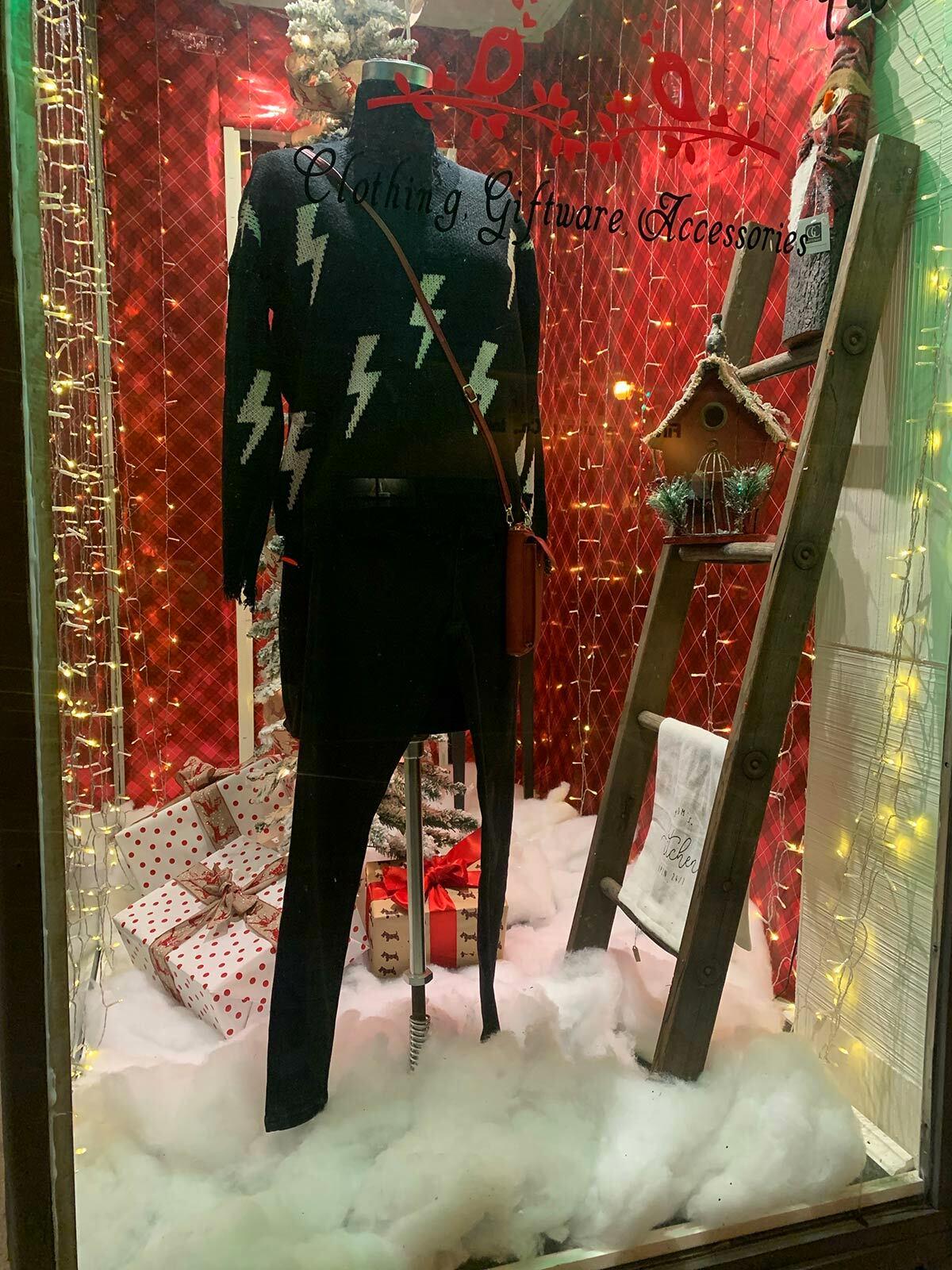 A holiday display in one of On a Lark’s windows.
