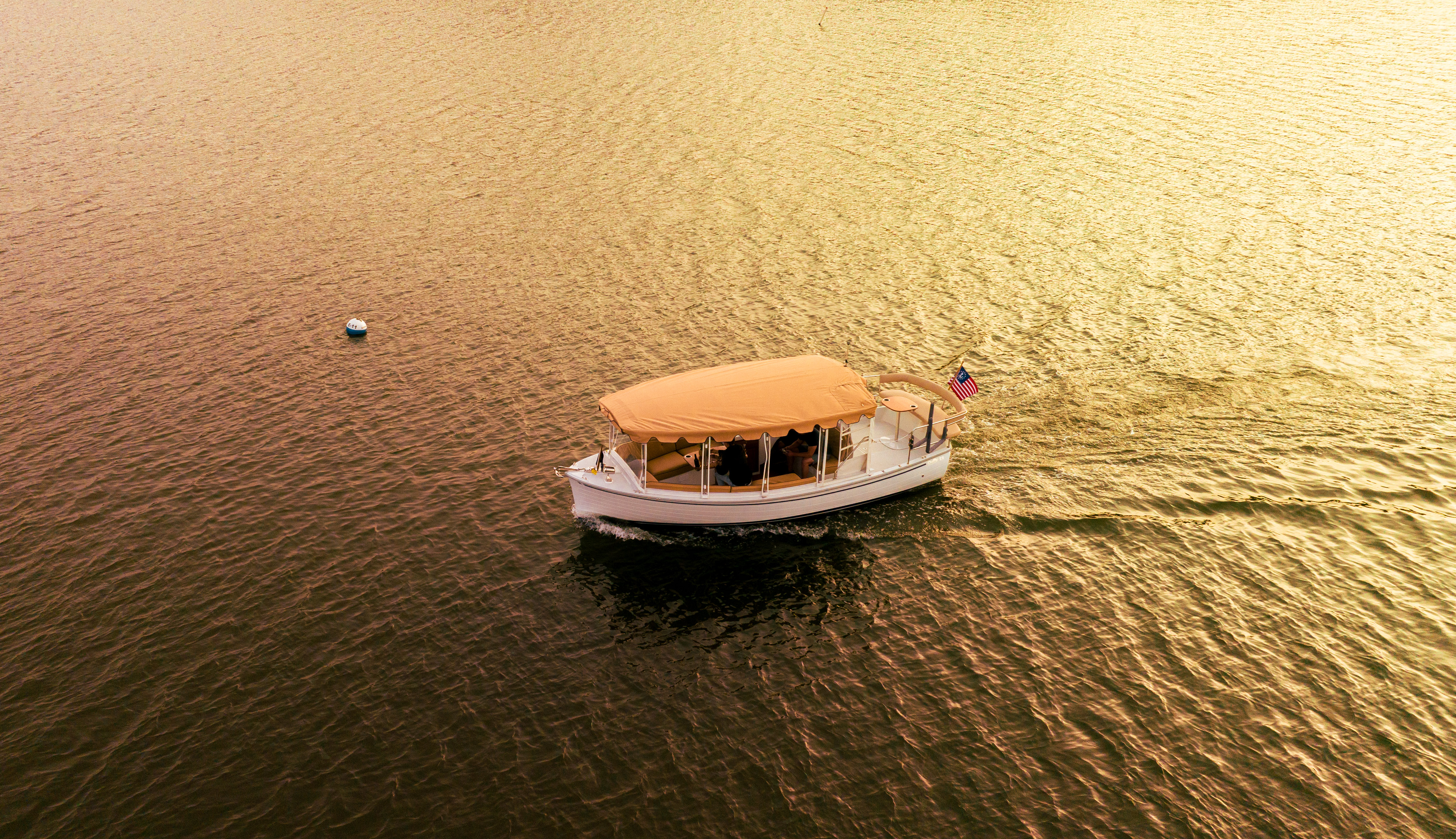 The electric Onda Bella, a 22-foot Duffy Sun Cruiser, launches from Seymour&#39;s Boatyard and offers &quot;European-inspired&quot; tours of Northport Harbor to small groups four times a day, every day. Photos courtesy Onda Bella Cruises. 