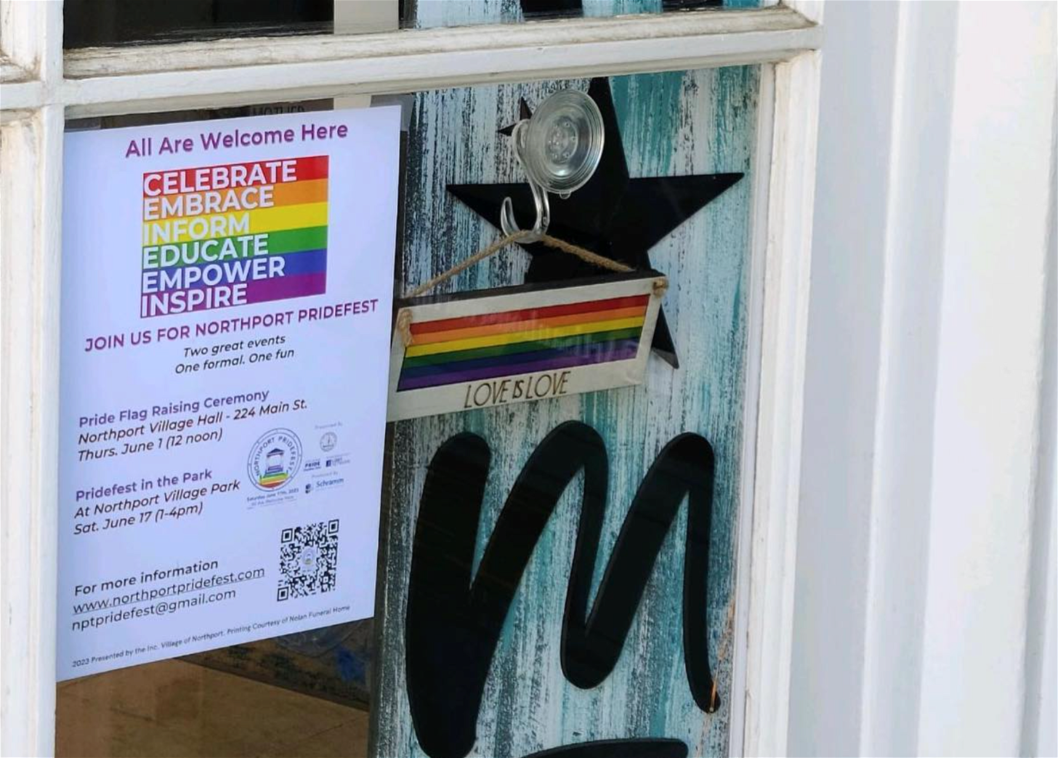In anticipation of anchor events throughout the month of June, storefronts in Northport Village have been promoting a key message of Pridefest: All are welcome here.