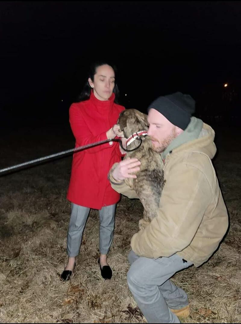 Randall Block and his girlfriend Tara Bencivenga moments after they were reunited with Athena. Photo courtesy of Teddy Henn.