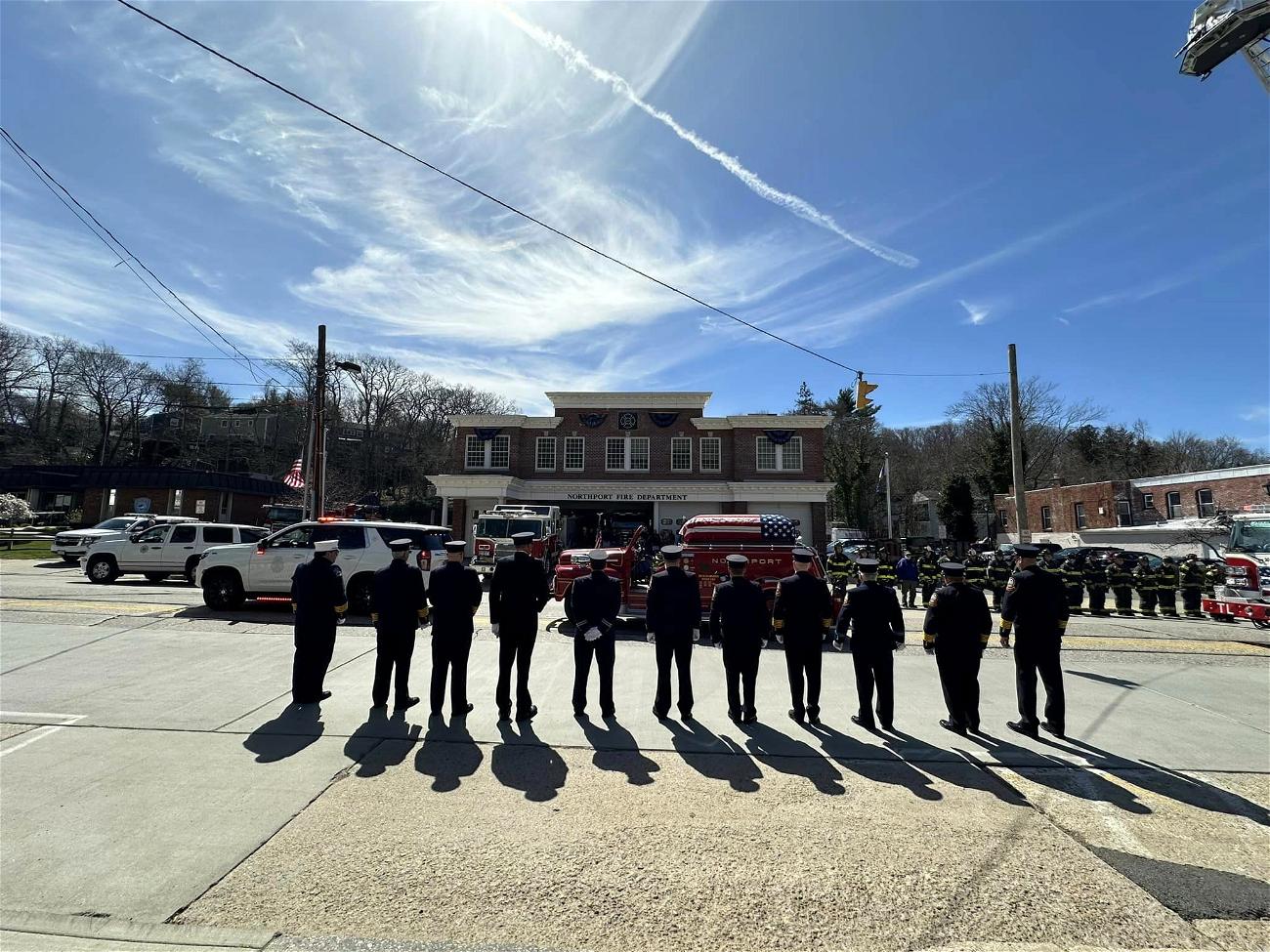 Members of the Northport Fire Department pay tribute to Ray Maloney, who passed away on April 3. Photo via the Northport Fire Department Facebook page.
