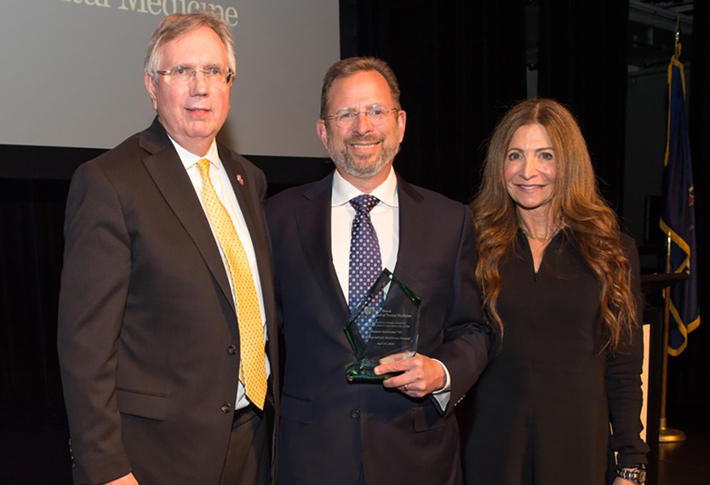 Dr. Robert Schindel (center) in 2023, after receiving the Dental Medicine Distinguished Alumni Award from Stony Brook. Photo via Stony Brook School of Dental Medicine.