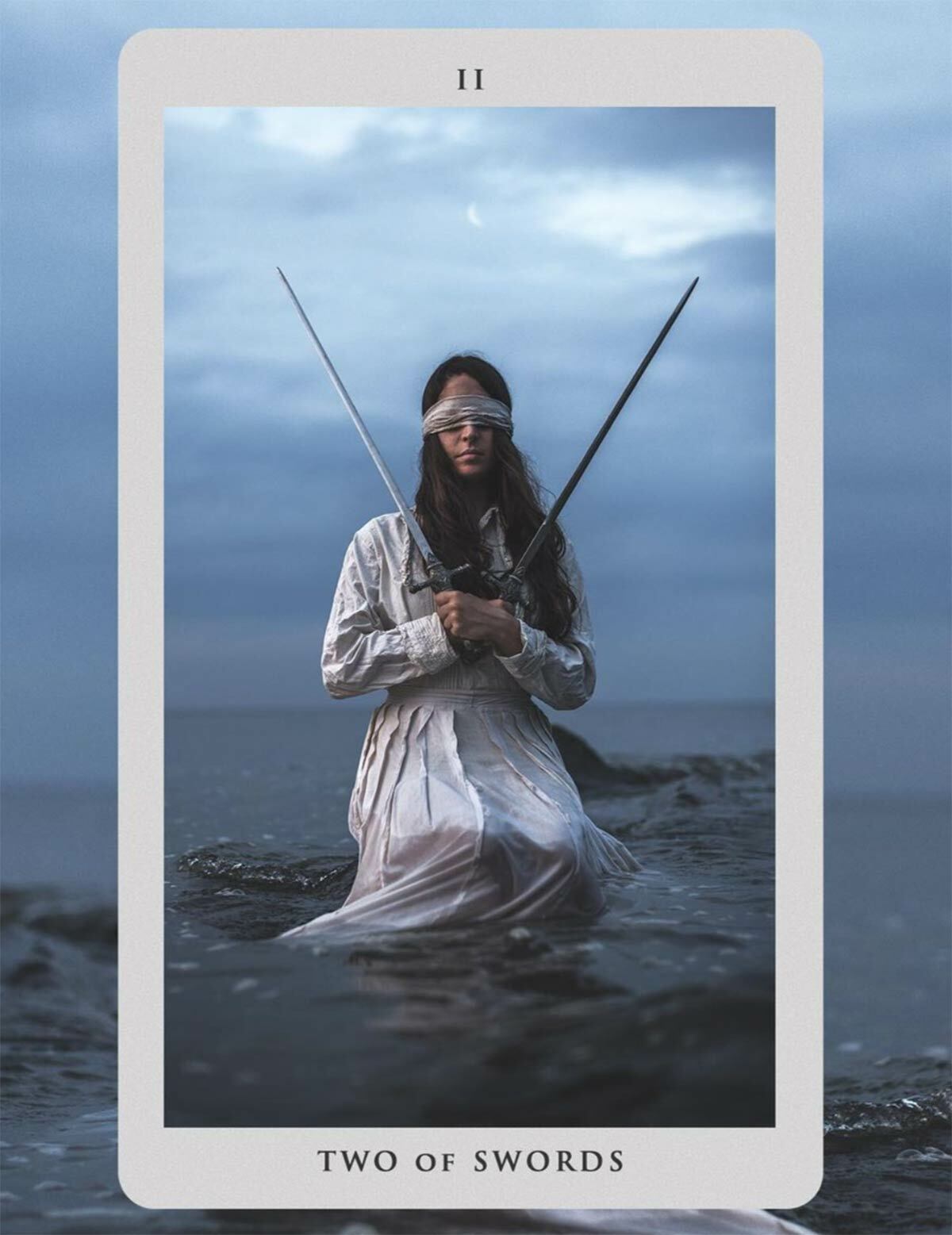 The “Somnia Tarot” deck includes 78 images by Nicolas Bruno. “Two of Swords” image via Instagram.