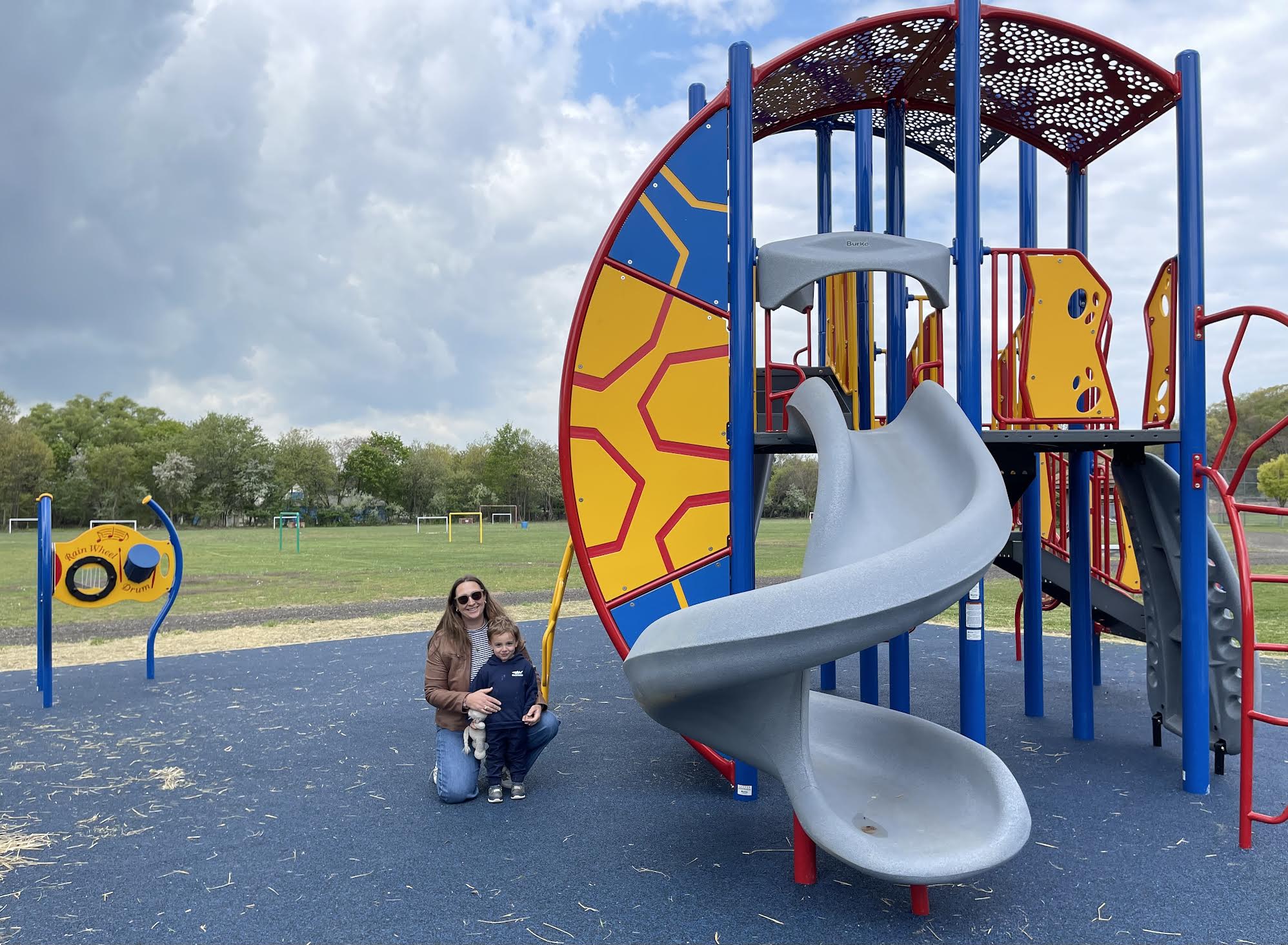 Northport Village Trustee Meghan Dolan with her son, Luca, at the new Steers Park playground.