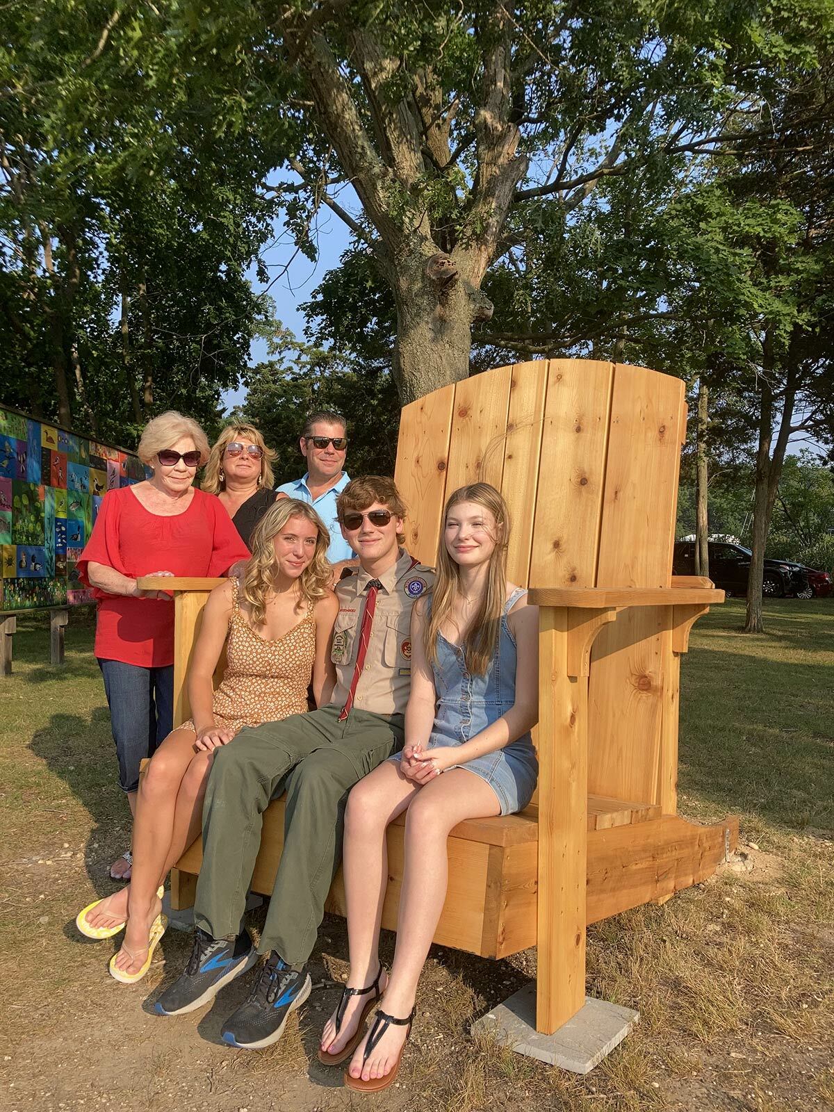 Eagle Scout Thomas Serra (seated, center) with, clockwise from left: grandmother Maureen VanPelt, parents Krista and Robert Serra, sister Sofia, and girlfriend Ryan Pupilla.