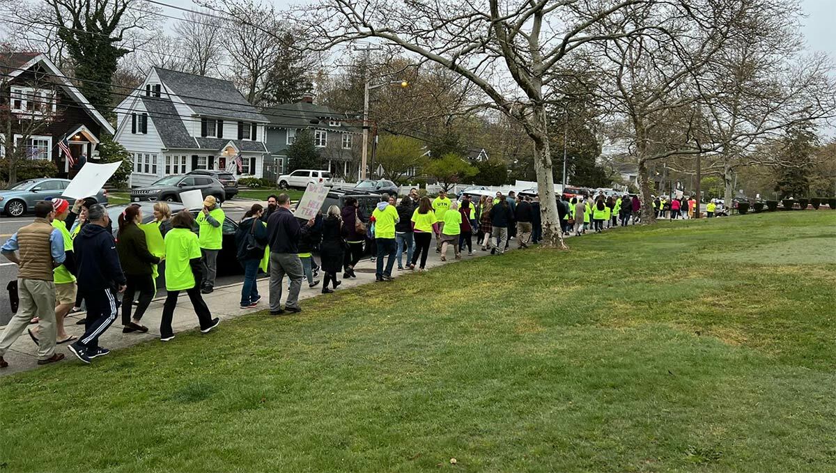 UTN members outside of the Brosnan building last Tuesday, April 26. The group gathered before a BOE meeting in support of the district’s coaches, health and physical education teachers. Photo via UTN Facebook page.