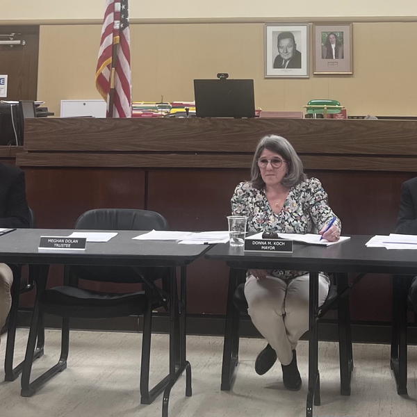 Dave Weber (left) and Rich Boziwick were sworn into their terms as Northport Village trustees at the April 3 Village board meeting. 