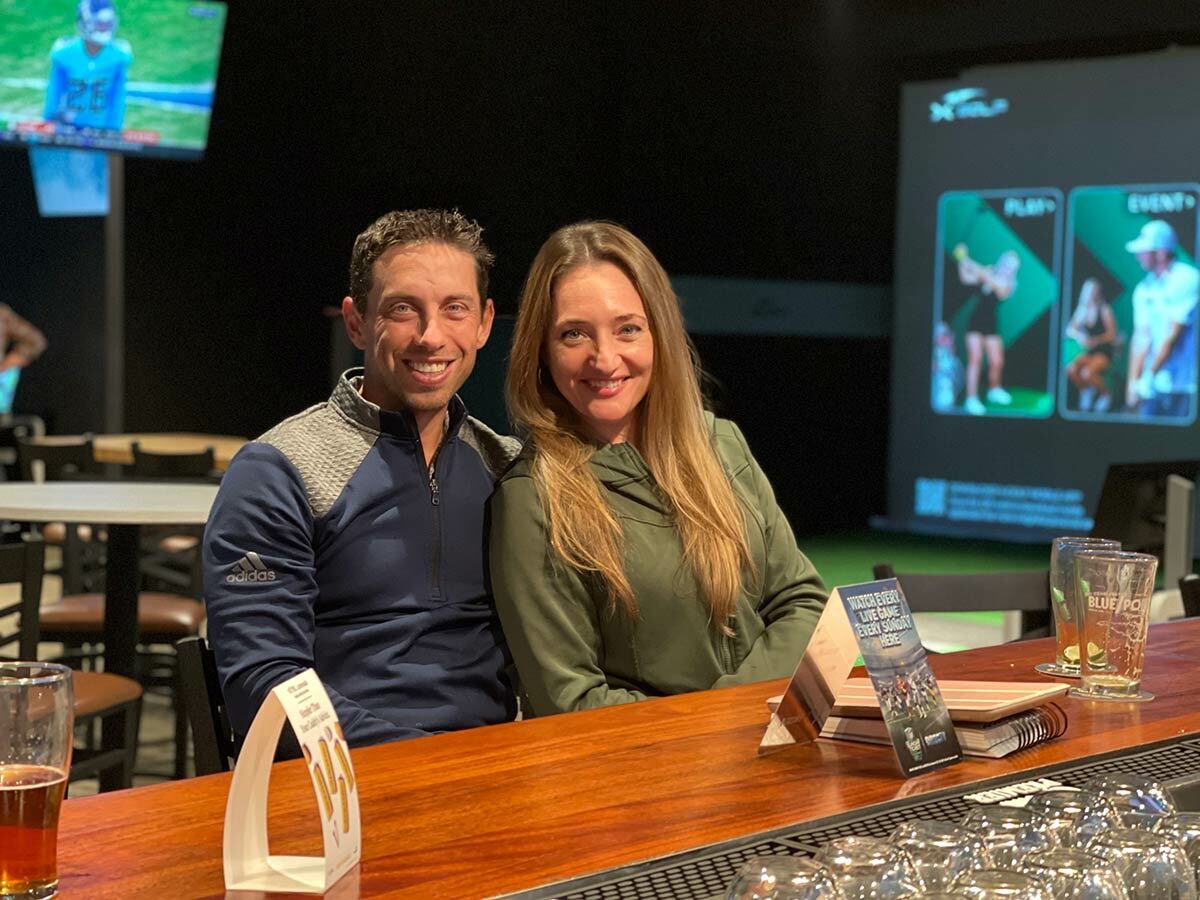 Geoff Schwartz and his wife, Pauline, at their X-Golf bar in Commack.